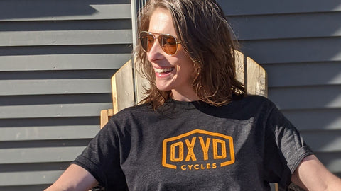Laughing woman wearing Oxyd Cycles Borderline t-shirt.